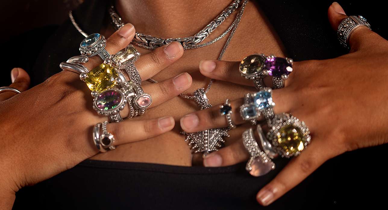 EthnoPur natural gemstone rings worn on the hands